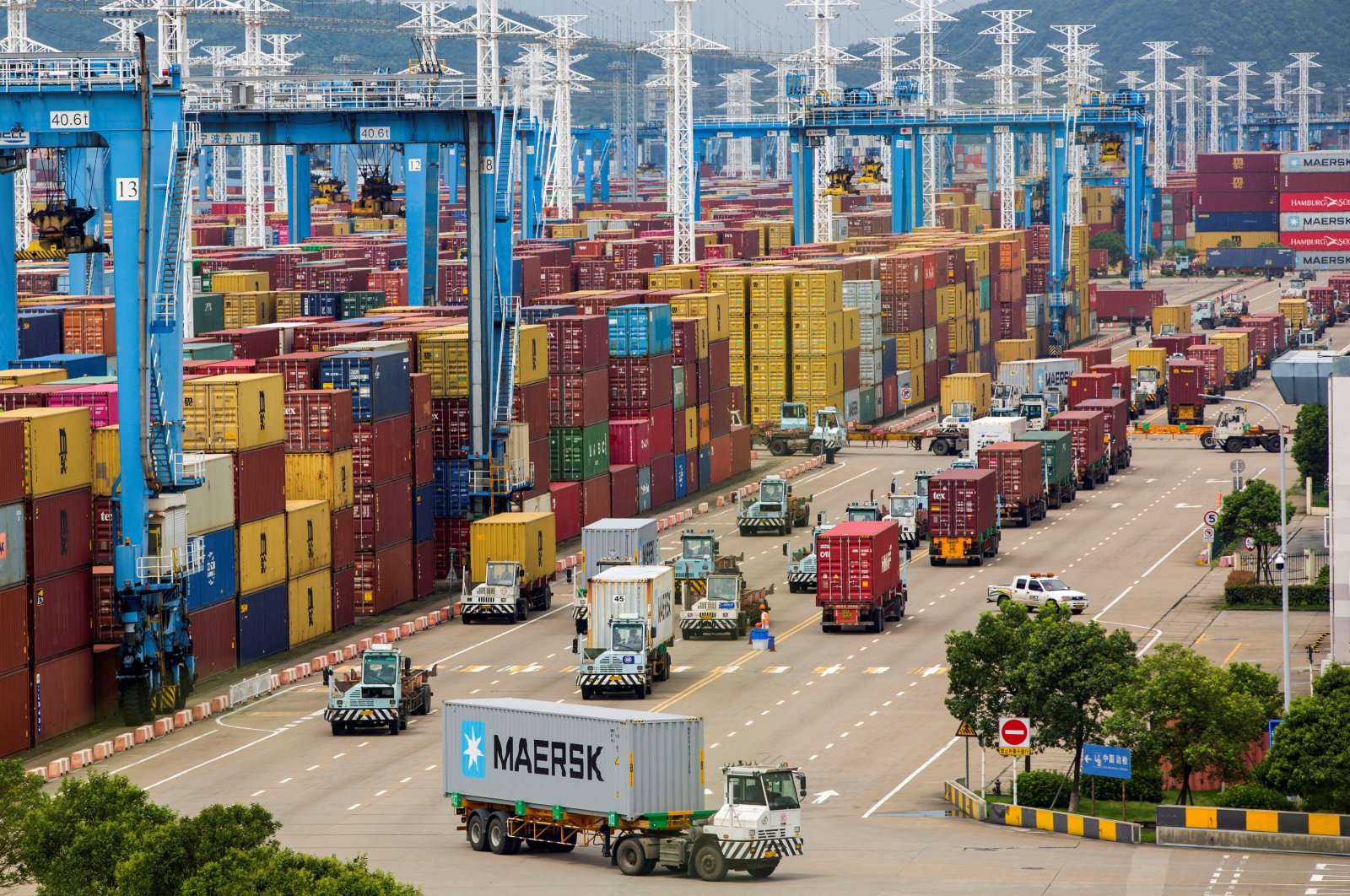 Lines of trucks are seen at a container terminal of Ningbo Zhoushan port in Zhejiang province, China, Aug. 15, 2021. (Reuters Photo)
