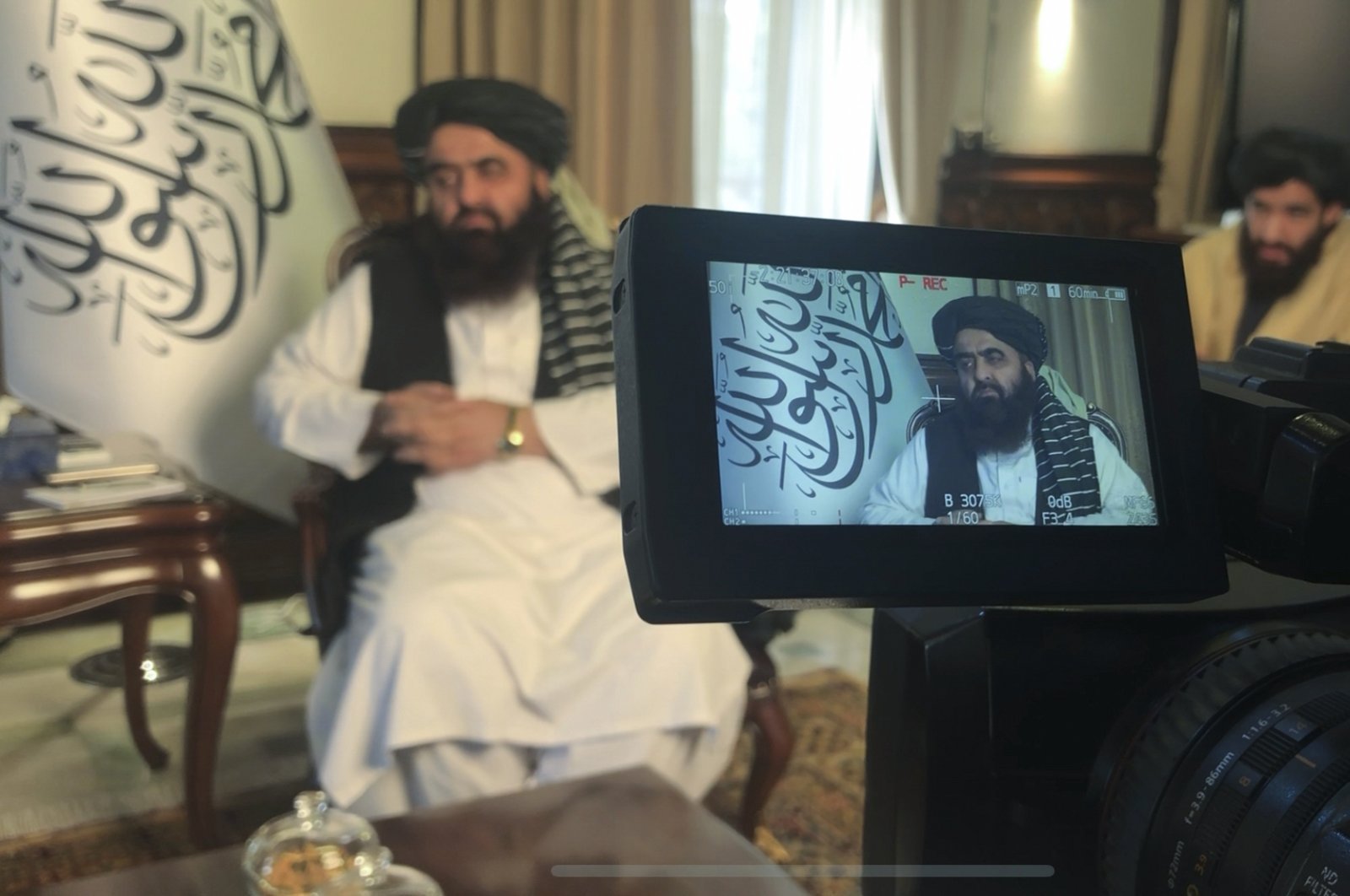 The foreign minister in Afghanistan&#039;s new Taliban-run Cabinet, Amir Khan Muttaqi speaks during an interview in Kabul, Afghanistan, Dec. 12, 2021. (AP Photo)