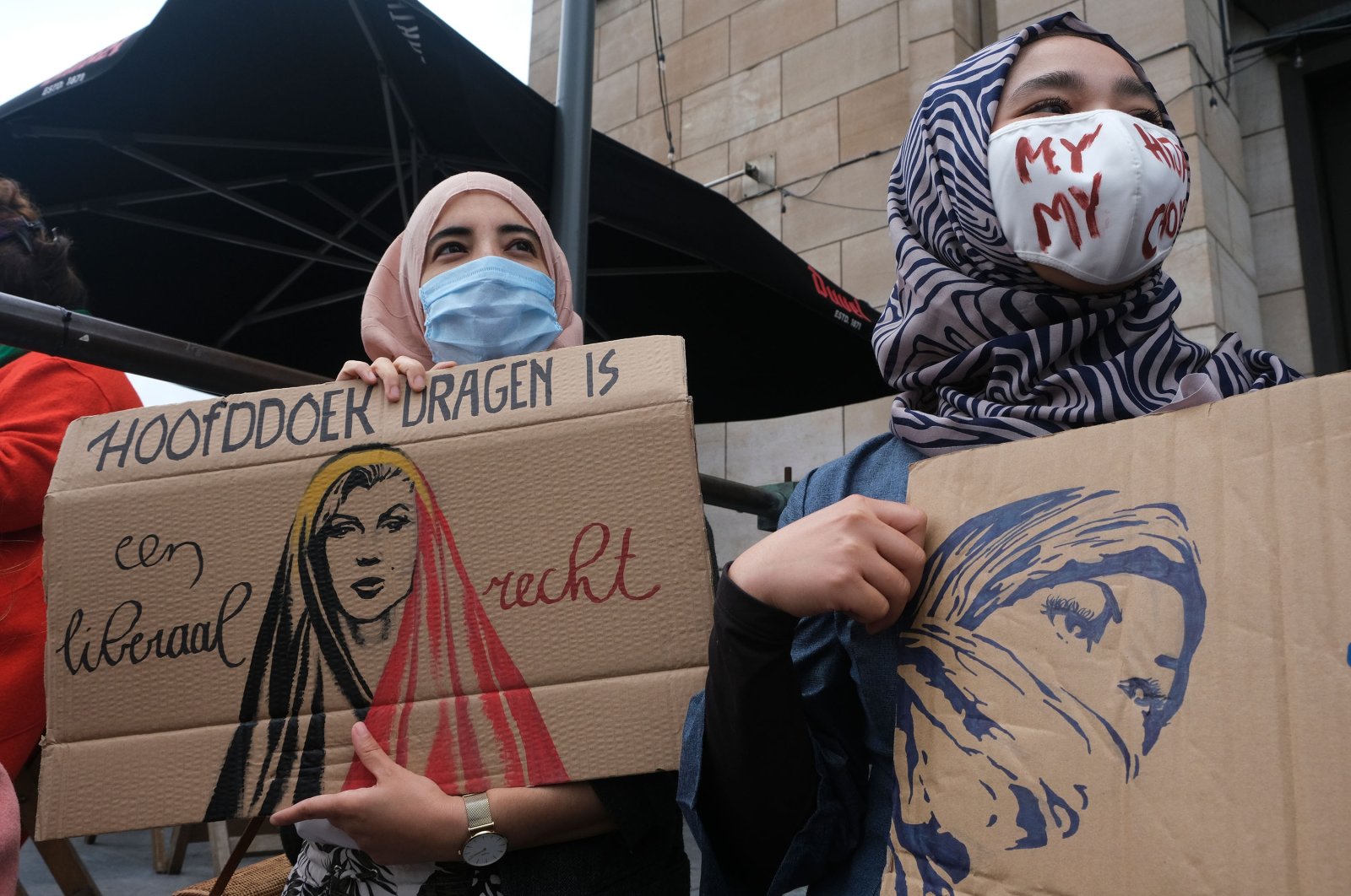 Protesters take part in a rally against Belgium&#039;s Constitutional Court rule to prohibit the use of headscarves in universities, Brussels, Belgium, July 5, 2020. (Shutterstock Photo)