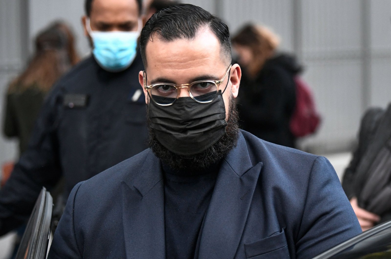Alexandre Benalla leaves the courthouse in Paris after hearing the verdict in his trial on charges of assaulting a young couple during a May Day protest in 2018 when he was the French president&#039;s bodyguard, Nov. 5, 2021. (AFP File Photo)