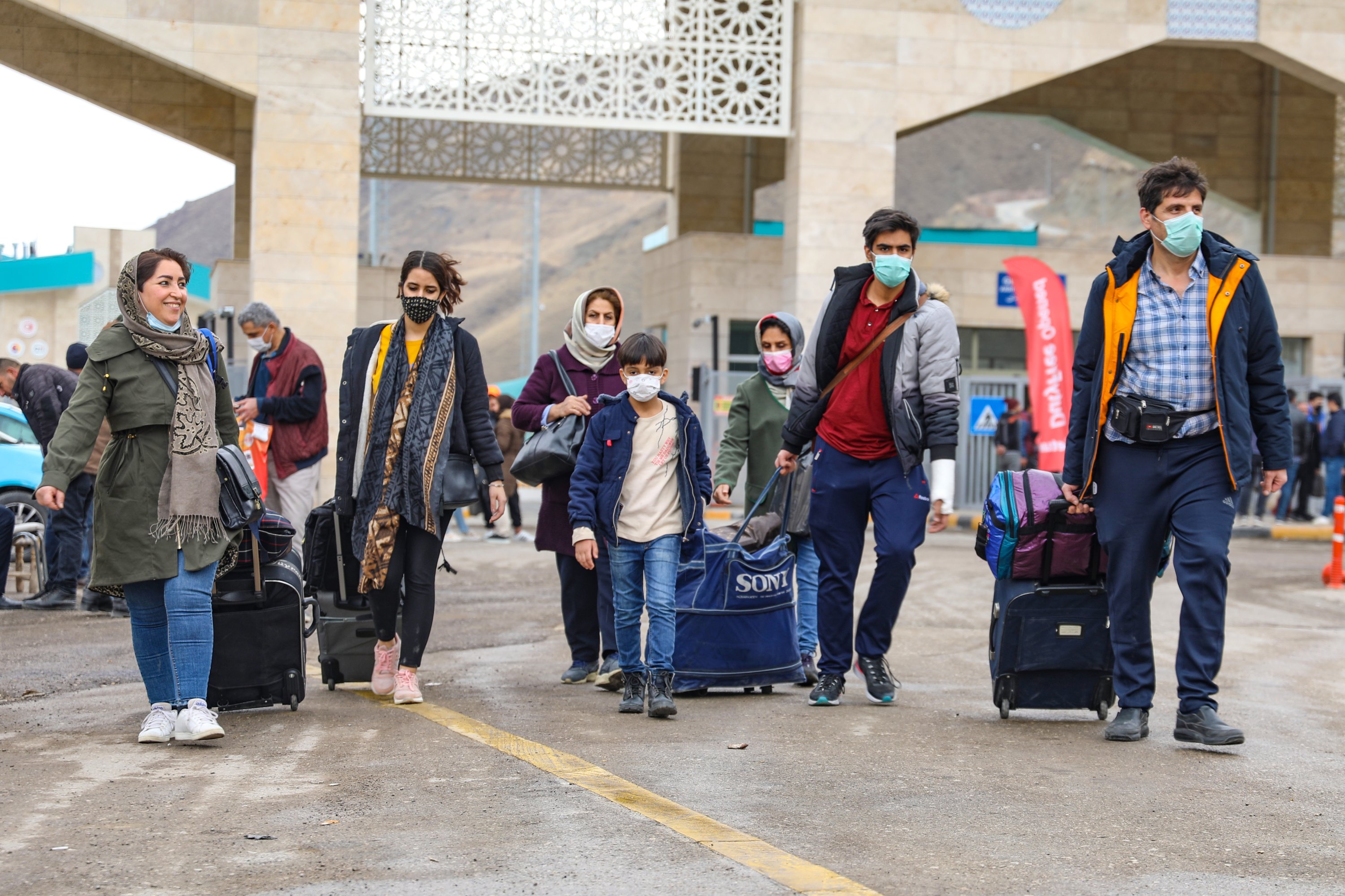 Iranian tourists are seen at Kapıköy Border Gate in eastern Van province near the Iranian border, Turkey, Nov. 26, 2021. (AA Photo)