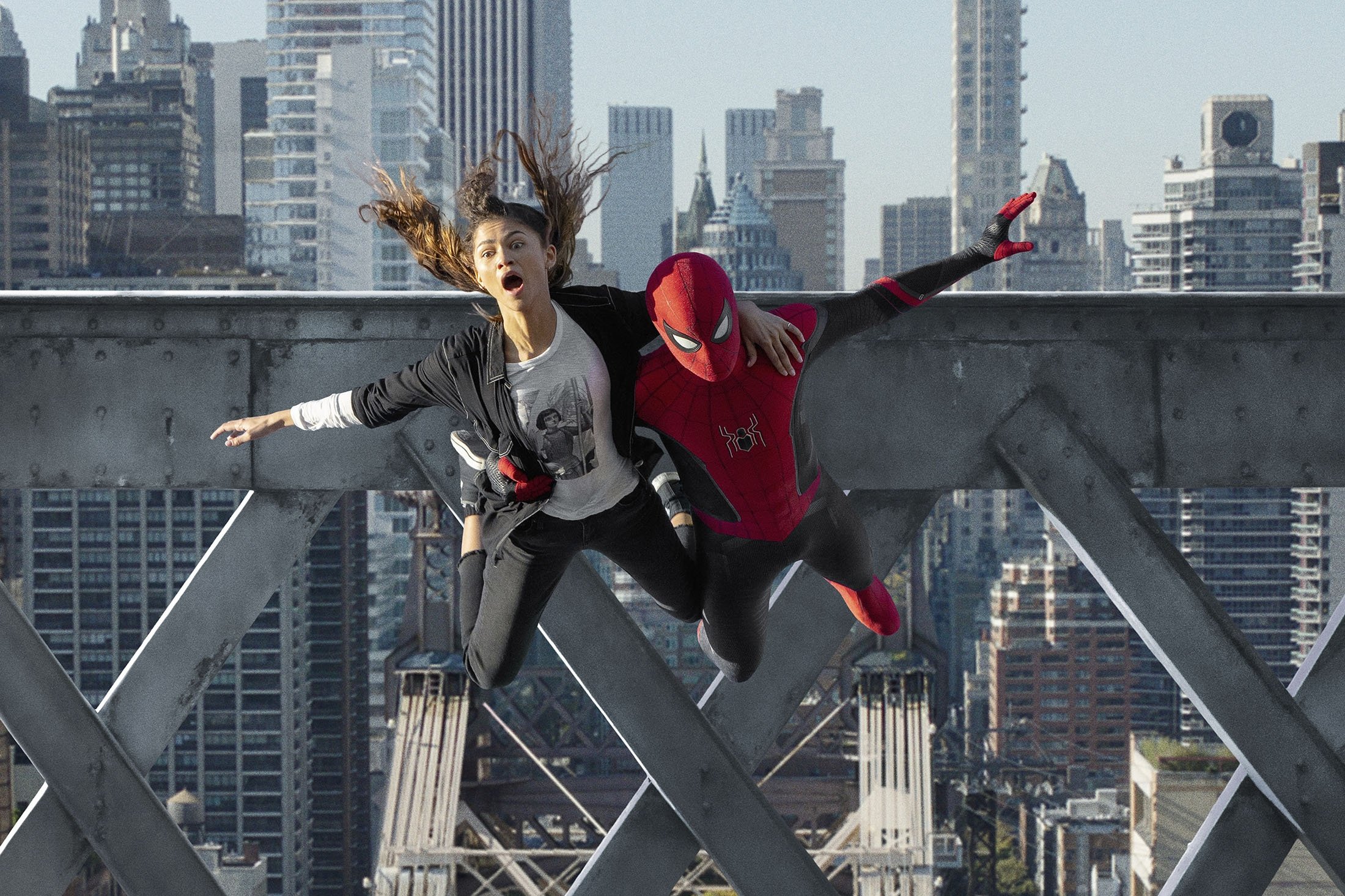 Zendaya (L) and Tom Holland in a scene from the film “Spider-Man: No Way Home.” (Sony Pictures via AP)
