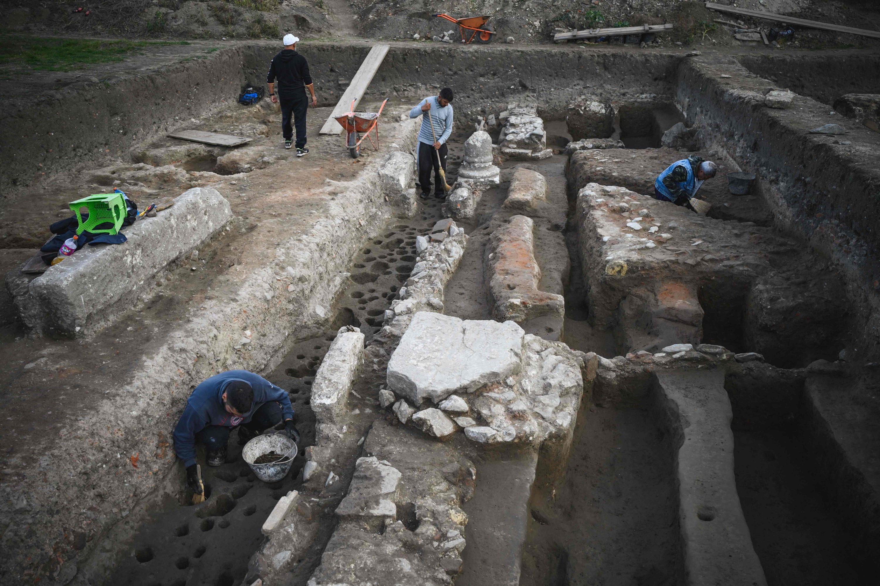 Archeologists work at an archaeological site right next to a coal mine and a power plant, in Stari Kostolac, Serbia on Dec. 3, 2021. (AFP Photo)