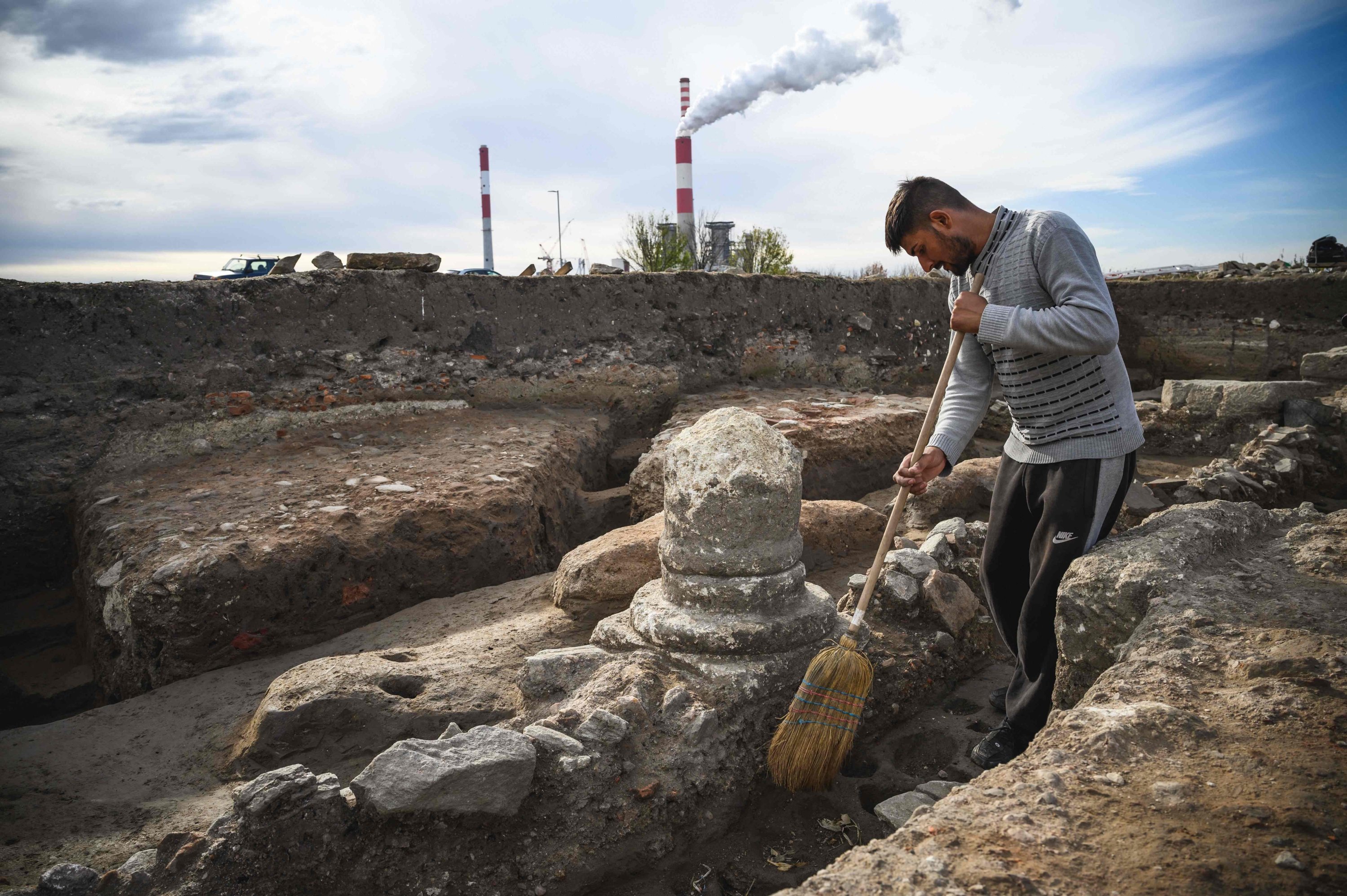 Archeologists work at an archeological site right next to a coal mine and a power plant, in Stari Kostolac, Serbia, Dec. 3, 2021. (AFP Photo)