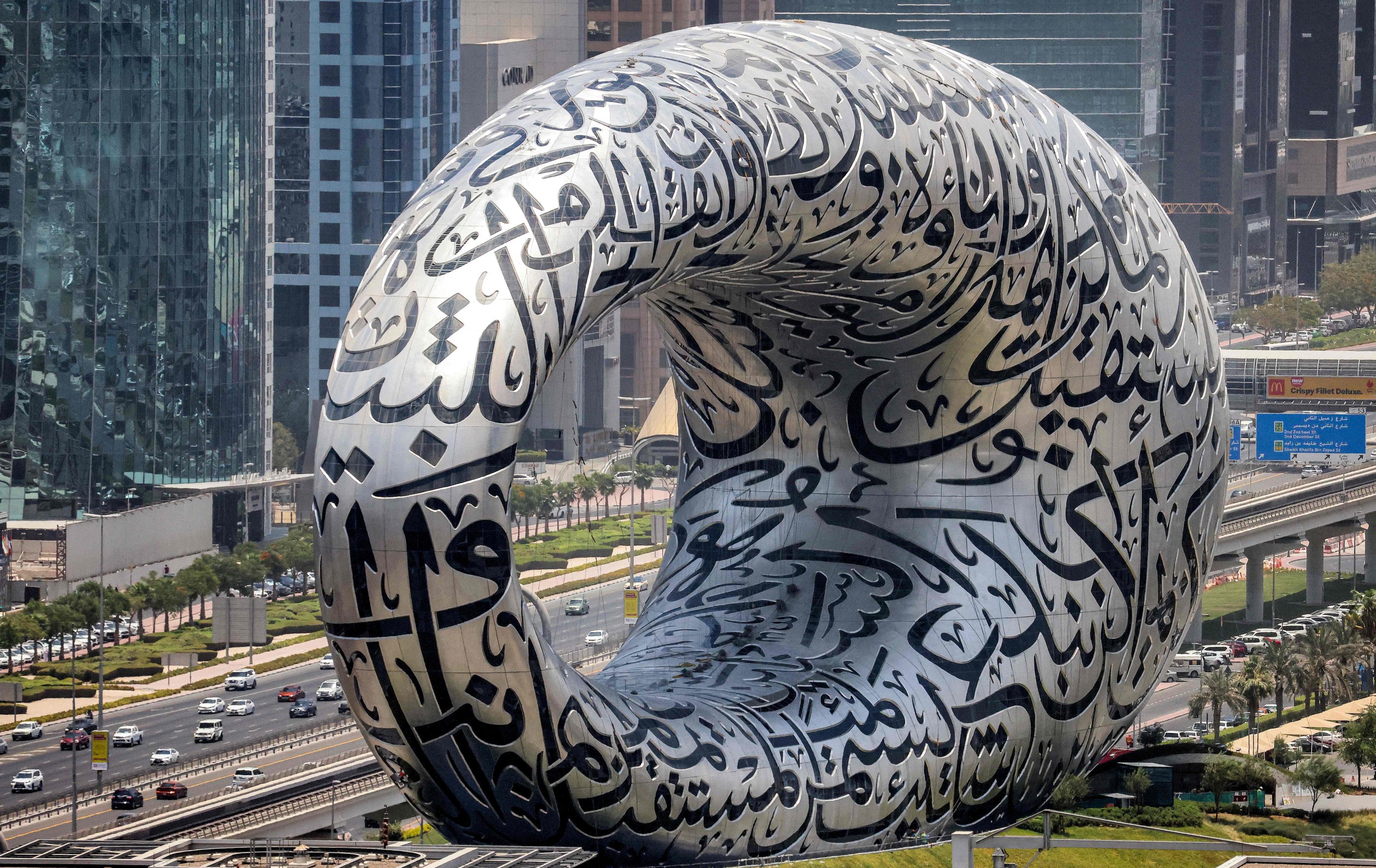 Arabic calligraphy installation outside the Museum of the Future on Sheikh Zayed Road, Dubai, United Arab Emirates, June 30, 2021. (AFP)