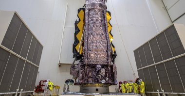 NASA’s James Webb Space Telescope is secured on top of the Ariane 5 rocket that will launch it to space from Europe’s Spaceport in Kourou, French Guiana, Dec. 11, 2021. (AP Photo)