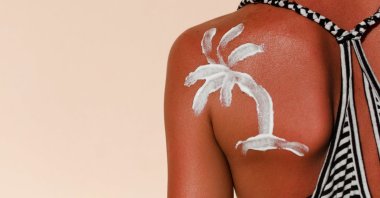 An artificial sunbath, like a natural one, isn&#039;t without risks, doctors warn. (Shutterstock Photo) 