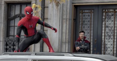 Tom Holland (L) and Benedict Cumberbatch in a scene from the film “Spider-Man: No Way Home.” (Sony Pictures via AP)