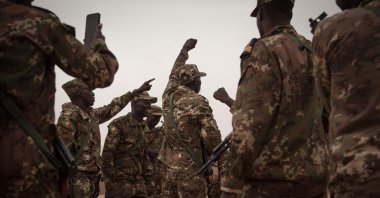 Malian soldiers dance after the handover ceremony of the Barkhane military base by the French army in Timbuktu, Mali, Dec. 14, 2021. (AFP Photo)