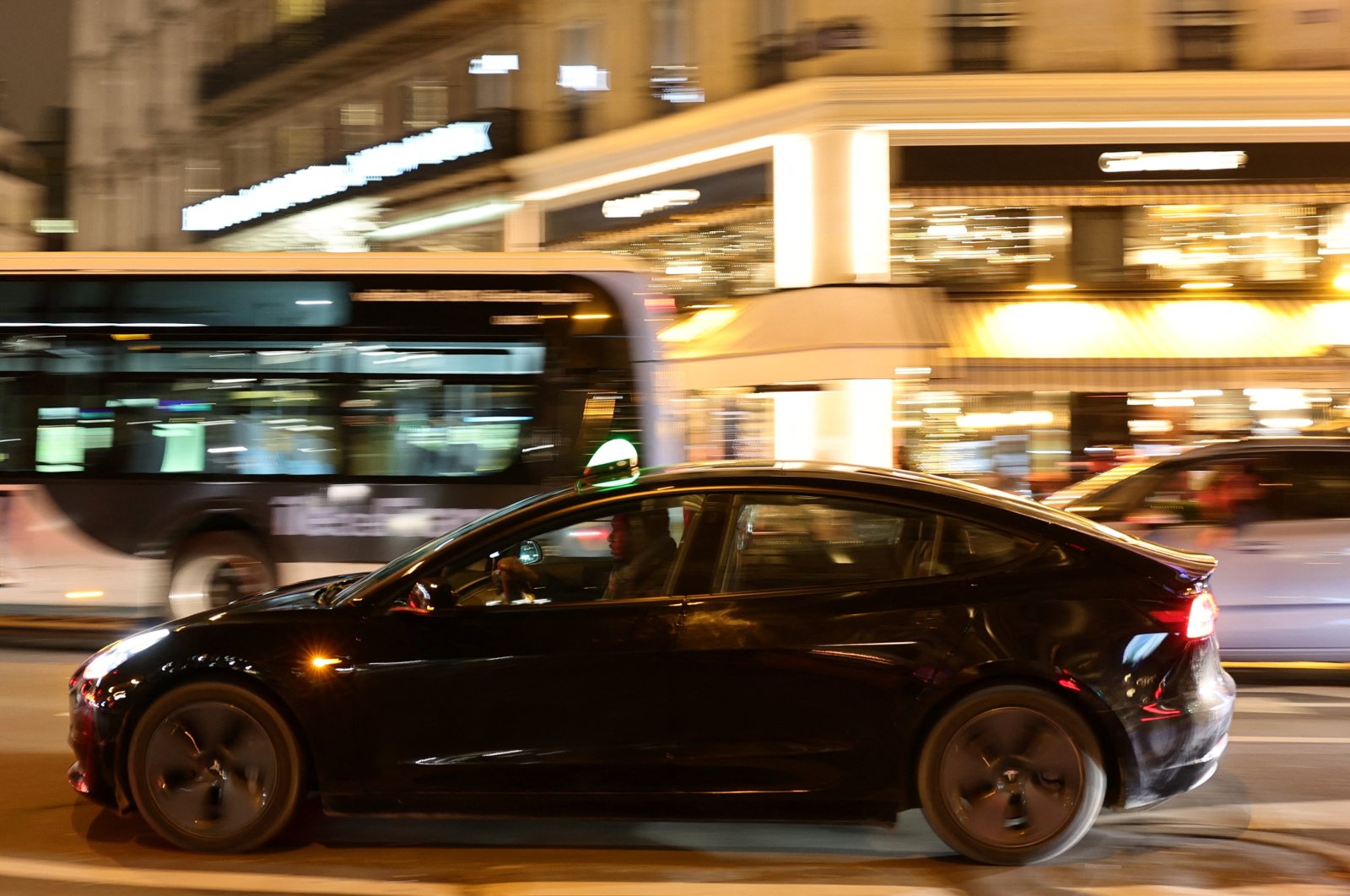 A man drives a Tesla taxi car in Paris, France, Dec. 14, 2021. (Reuters Photo)