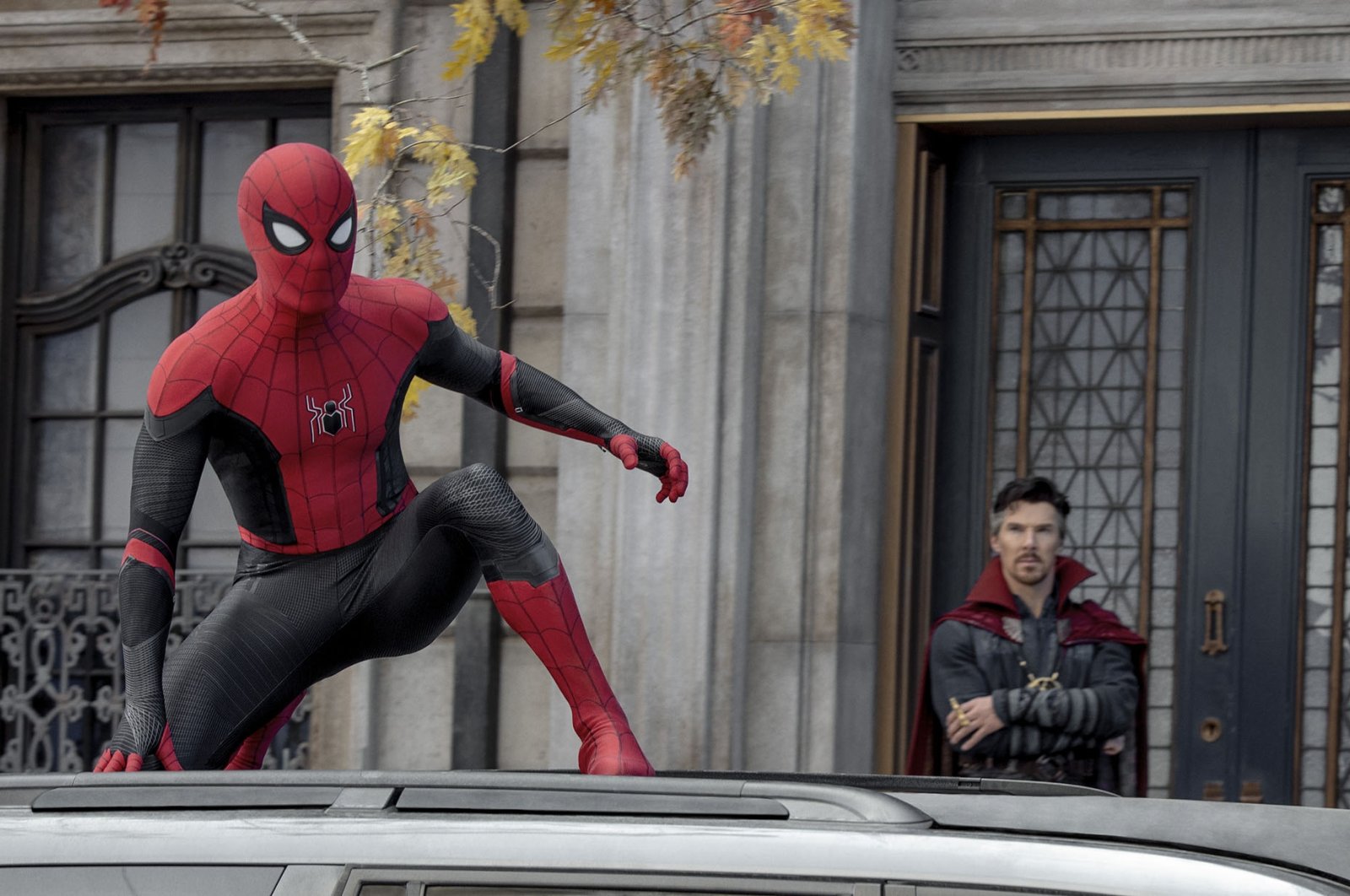 Tom Holland (L) and Benedict Cumberbatch in a scene from the film “Spider-Man: No Way Home.” (Sony Pictures via AP)