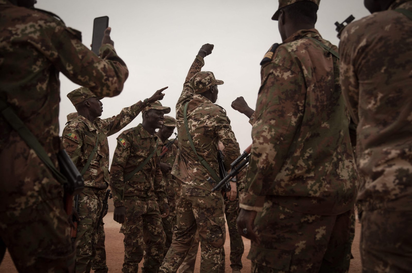 Malian soldiers dance after the handover ceremony of the Barkhane military base by the French army in Timbuktu, Mali, Dec. 14, 2021. (AFP Photo)