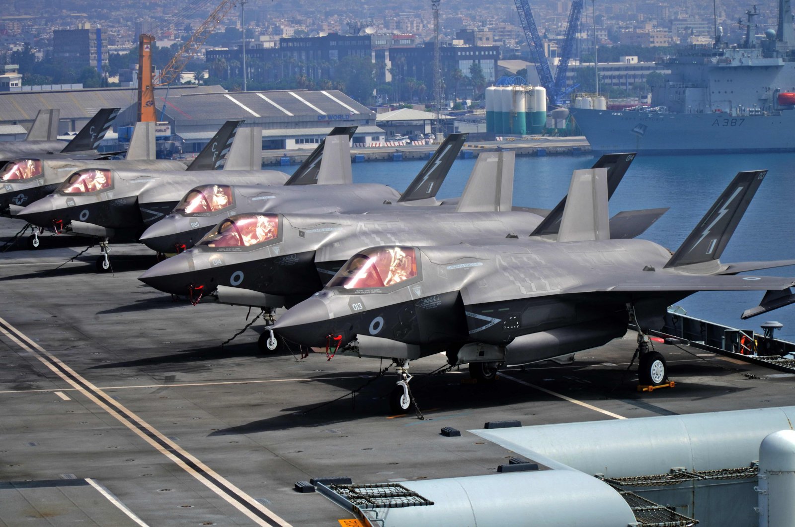 A view of Royal Navy F-35B Lightning multirole combat aircraft parked aboard the deck of the Royal Navy&#039;s HMS Queen Elizabeth aircraft carrier while moored in the new port of Greek Cypriot administration’s southern Limassol province, Cyprus, July 1, 2021. (AFP Photo)