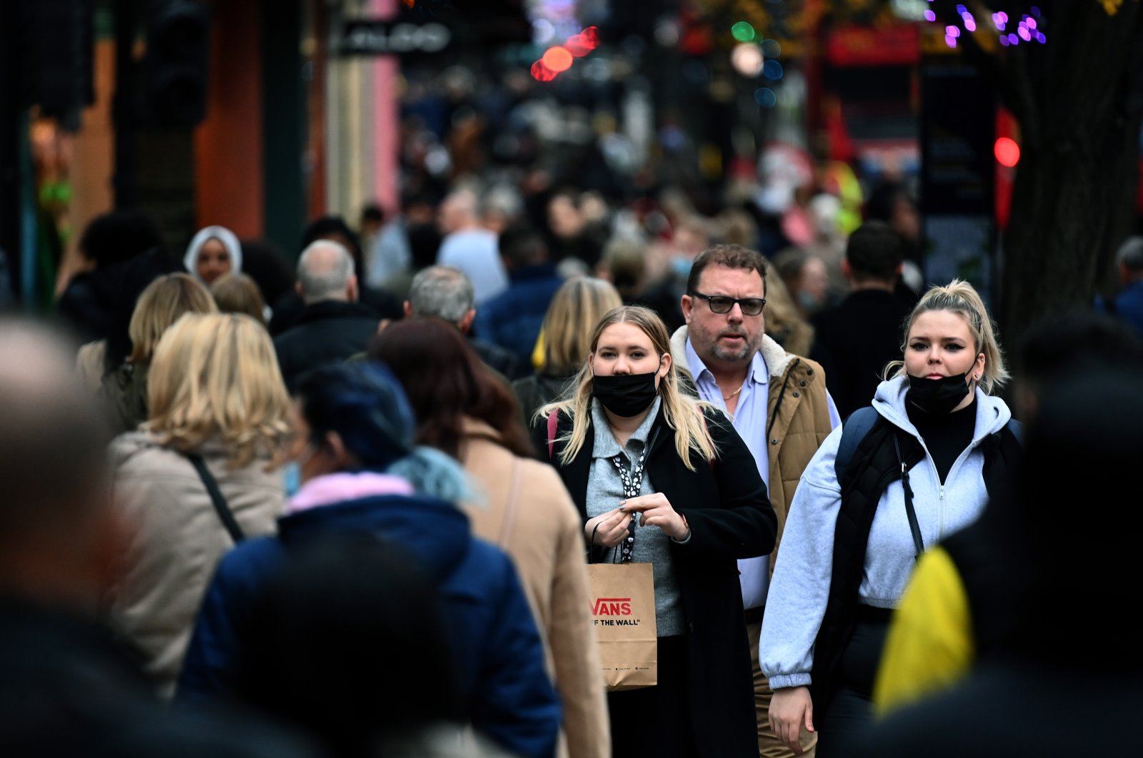 Shoppers walk along Oxford Street in London, Britain, Dec. 15, 2021. (EPA Photo)