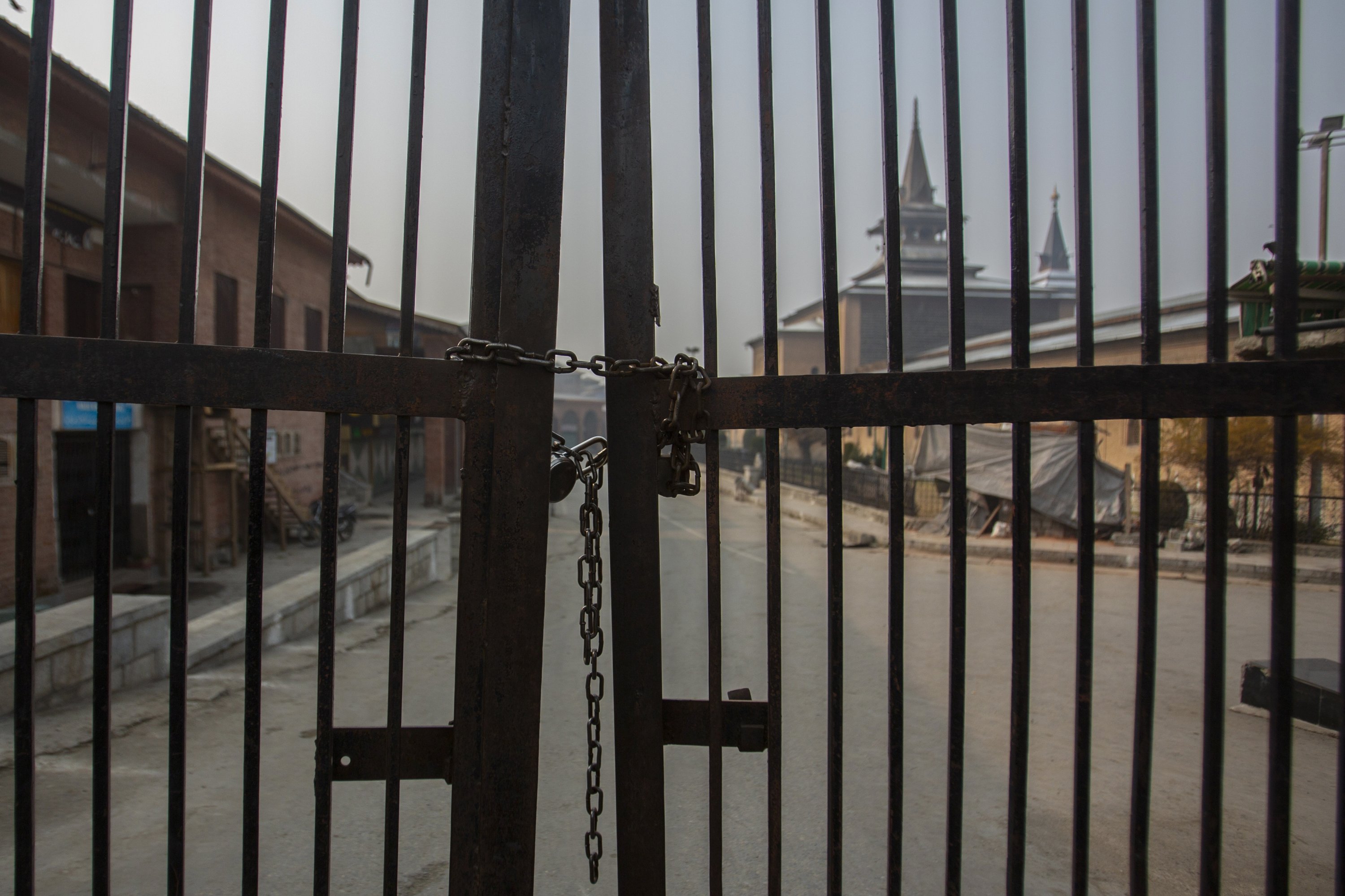 Kashmir's Jamia Masjid, or the grand mosque, is seen through its gate that remains locked on Fridays in Srinagar, Indian-controlled Kashmir, Nov. 26, 2021. (AP Photo)