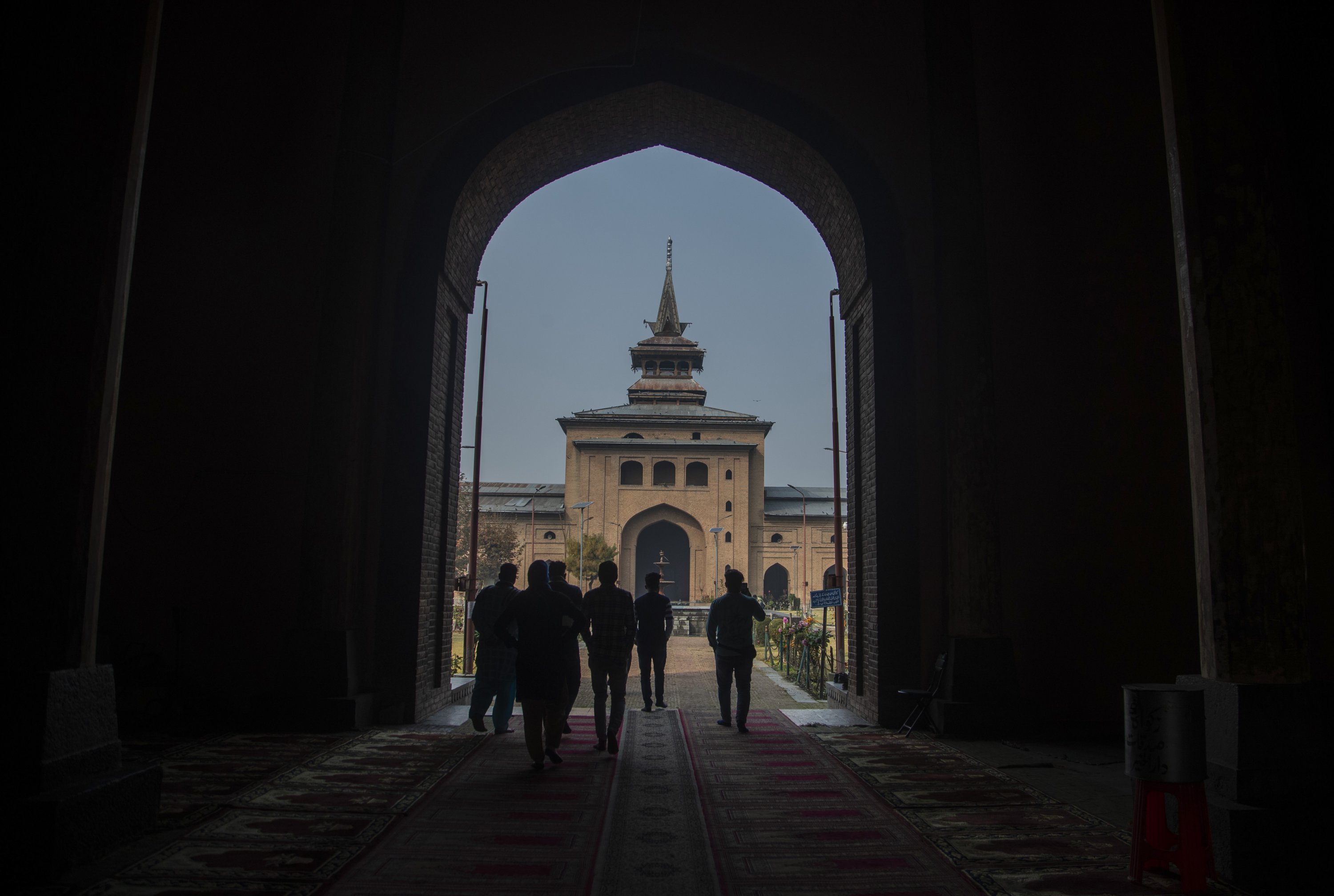 Indian tourists visit the Jamia Masjid, or the grand mosque in Srinagar, Indian-controlled Kashmir, Nov. 13, 2021. (AP Photo)