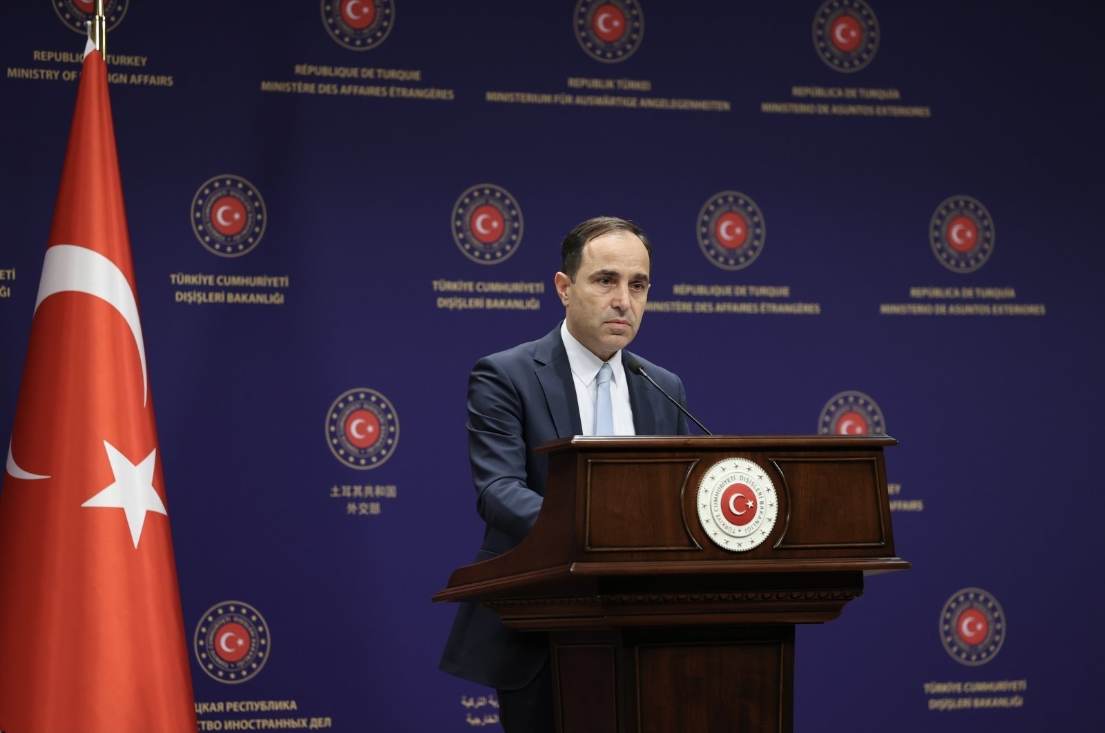 Foreign Ministry spokesperson Tanju Bilgiç listens during a press conference in Ankara, Turkey, June 25, 2021. (AA File Photo)