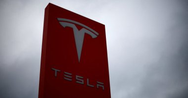 The logo of Tesla is pictured at a dealership in Chambourcy, near Paris, France, Dec. 15, 2021. (Reuters Photo)