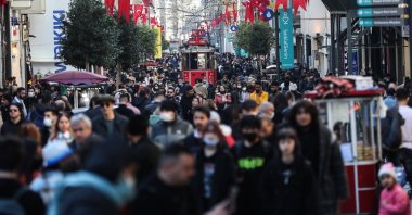 People walk on Istiklal Avenue, the main shopping street in Istanbul, Turkey, Dec. 2, 2021. (EPA Photo)