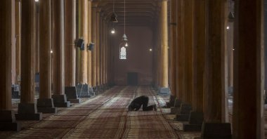 A Kashmiri man offers prayers inside the Jamia Masjid, or the grand mosque in Srinagar, Indian-controlled Kashmir, Nov. 13, 2021. (AP Photo)