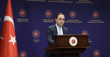 Foreign Ministry spokesperson Tanju Bilgiç listens during a press conference in Ankara, Turkey, June 25, 2021. (AA File Photo)