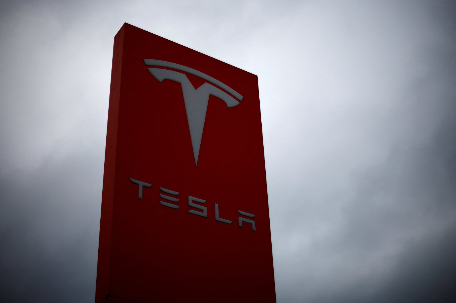 The logo of Tesla is pictured at a dealership in Chambourcy, near Paris, France, Dec. 15, 2021. (Reuters Photo)