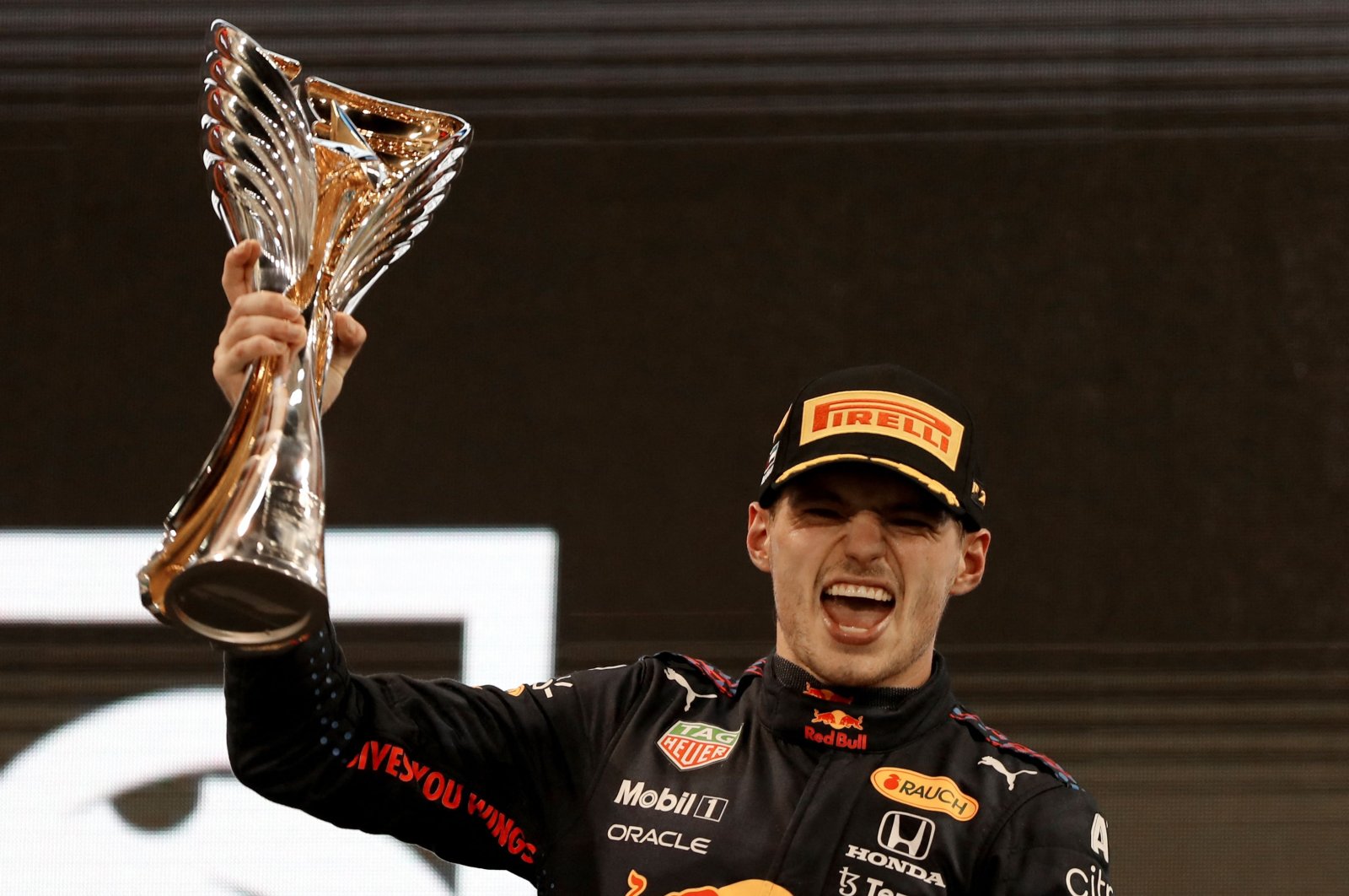 Red Bull&#039;s Max Verstappen celebrates winning the Abu Dhabi F1 GP and the 2021 world championship, Abu Dhabi, UAE, Dec. 12, 2021. (AFP Photo)