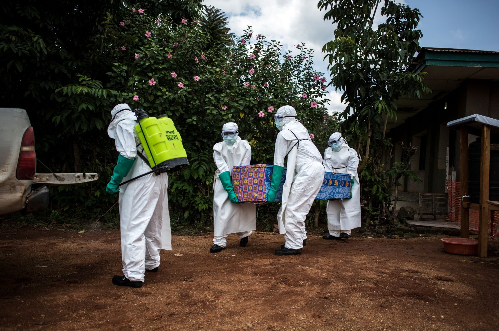 In this file photo taken on Aug. 22, 2018, health workers carry out the body of a patient with an unconfirmed case of the Ebola virus in Mangina, near Beni, in the North Kivu province, Democratic Republic of the Congo. (AFP Photo)