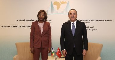 Foreign Minister Mevlüt Çavuşoğlu (R) poses with his counterpart from the Central African Republic, Sylvie Baipo Temon, during the 3rd Turkey-Africa Partnership Summit in Istanbul, Turkey, Dec. 16, 2021. (AA Photo)