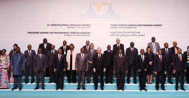 Foreign Minister Mevlüt Çavuşoğlu (C) and visiting foreign ministers are seen in a family photo before the opening of the third Turkey-Africa Partnership Summit&#039;s foreign ministers meeting in Istanbul, Turkey, Dec. 17, 2021. (AA Photo)