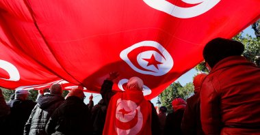 People attend a protest against Tunisian President Kais Saied's seizure of governing power and declaration of putting a new constitution to a public referendum, in Tunis, Tunisia, Dec. 17, 2021. (Reuters Photo)