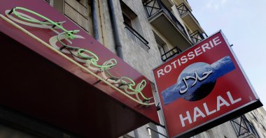 Halal signs are seen at a butcher shop in Paris, France, March 9, 2012. (AP File Photo)