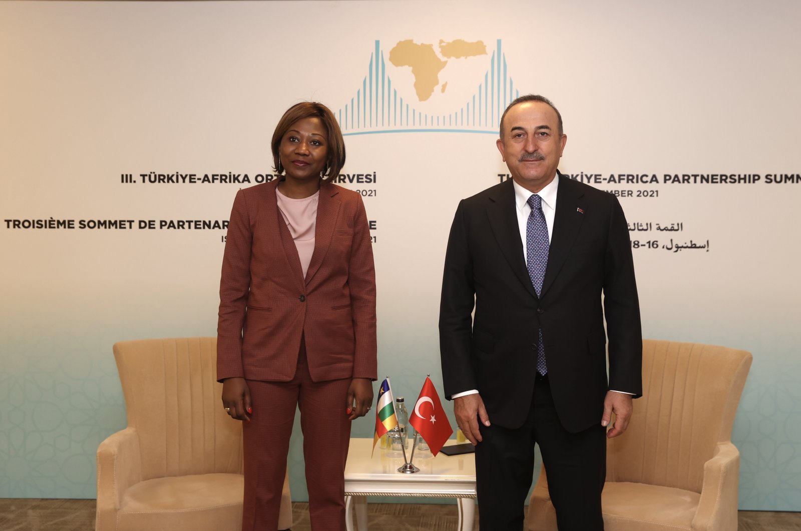 Foreign Minister Mevlüt Çavuşoğlu (R) poses with his counterpart from the Central African Republic, Sylvie Baipo Temon, during the 3rd Turkey-Africa Partnership Summit in Istanbul, Turkey, Dec. 16, 2021. (AA Photo)