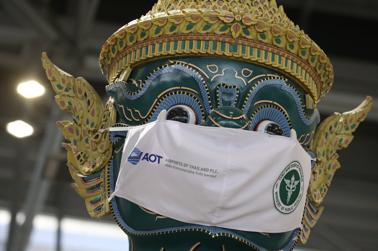 A large Ramayana giant guardian statue wearing a face mask as part of a campaign to prevent the spread of COVID-19 at Suvarnabhumi International Airport in Samut Prakan, Thailand, Dec. 17, 2021. (EPA Photo)