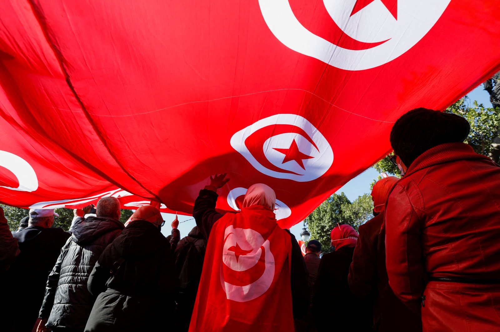 People attend a protest against Tunisian President Kais Saied&#039;s seizure of governing power and declaration of putting a new constitution to a public referendum, in Tunis, Tunisia, Dec. 17, 2021. (Reuters Photo)