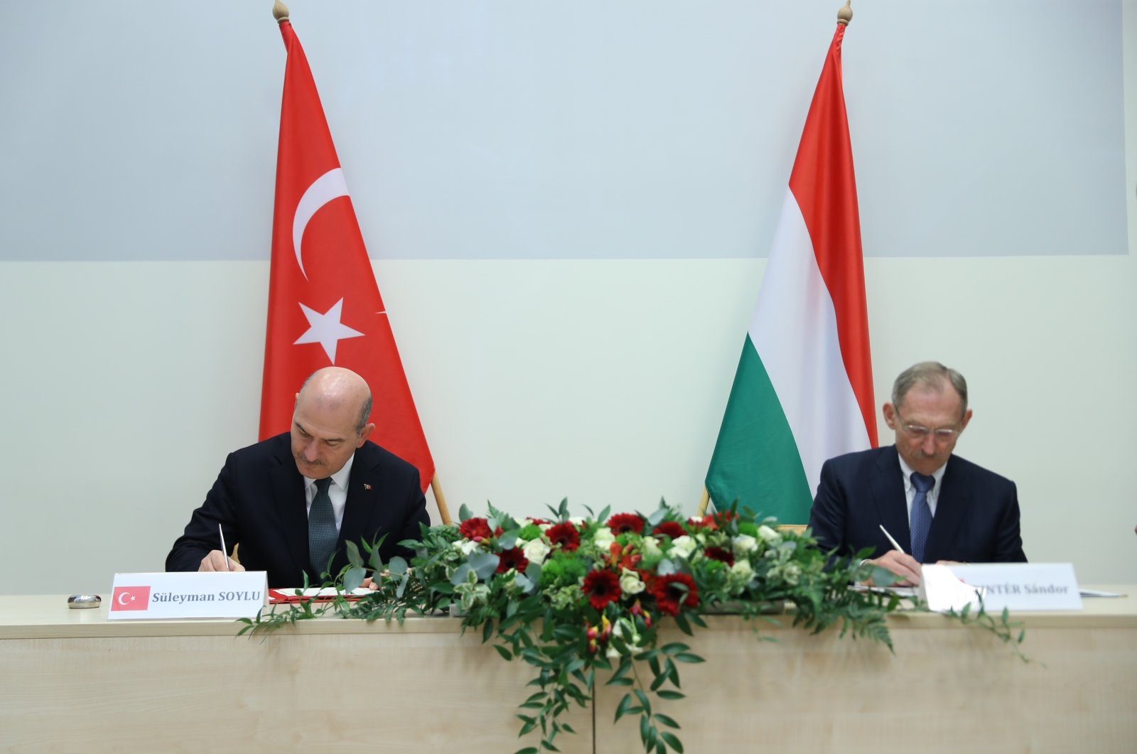 Interior Minister Süleyman Soylu and his Hungarian Counterpart Sandor Pinter sign a joint protocol in Budapest, Hungary, Friday, Dec. 17, 2021. (AA Photo)