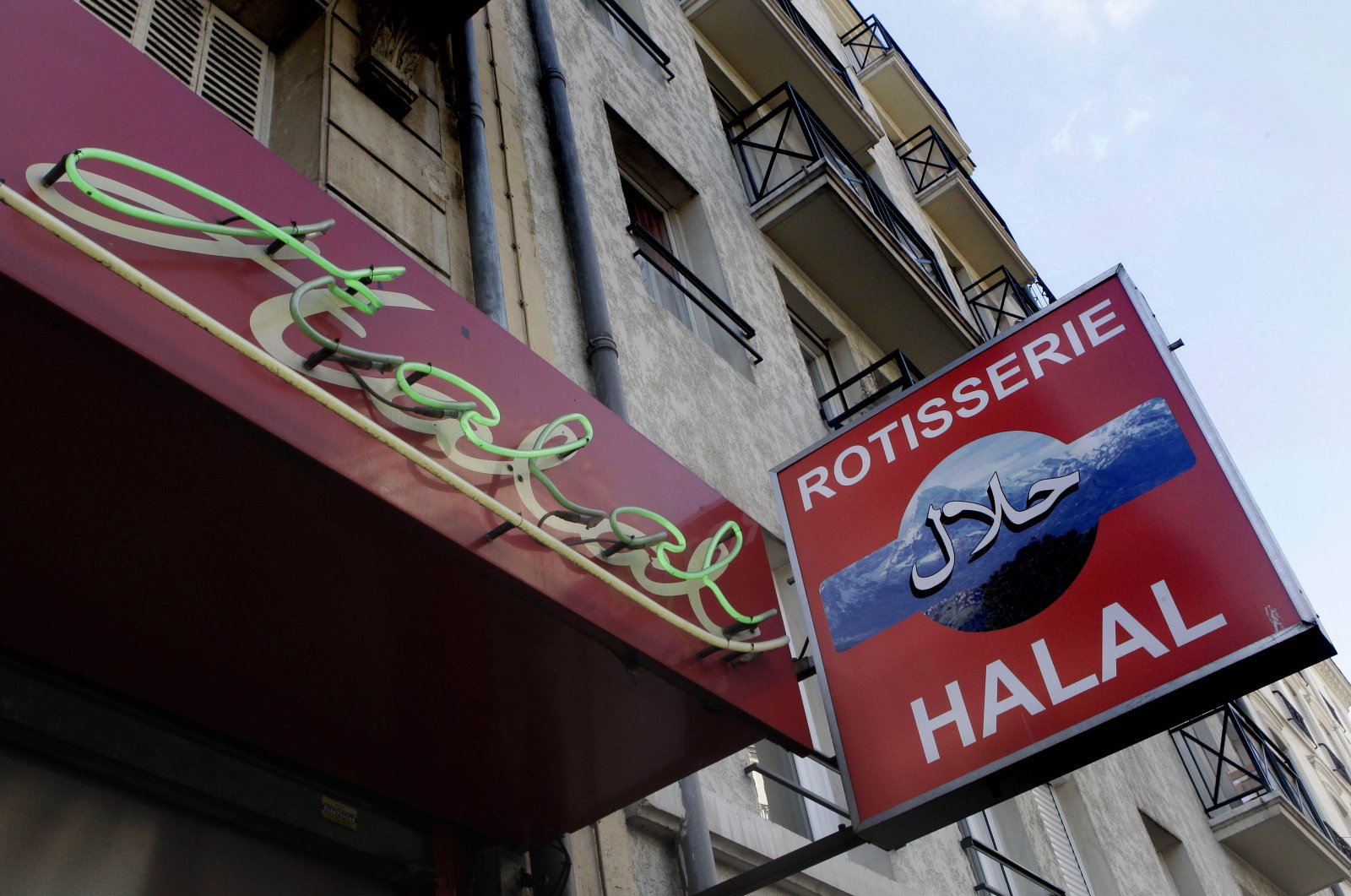 Halal signs are seen at a butcher shop in Paris, France, March 9, 2012. (AP File Photo)