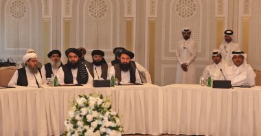 Members of the Taliban delegation Shahabuddin Delawar (L), Amir Khan Muttaqi and Khairullah Khairkhwa (C) meet with foreign diplomats in Qatar's capital Doha, Oct. 12, 2021. (AFP Photo)