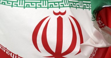 An Iranian flag flies in front of the U.N. office building housing IAEA headquarters, Vienna, Austria, May 24, 2021. (Reuters Photo)