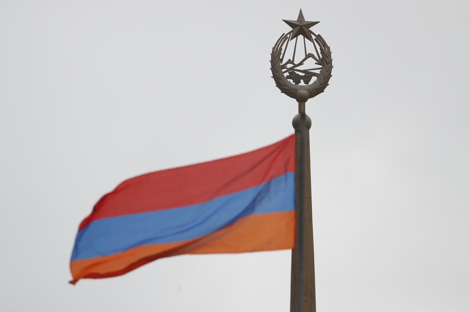 The Armenian national flag flaps at a railway station building in Yerevan, Armenia, April 18, 2018. (Getty Images)