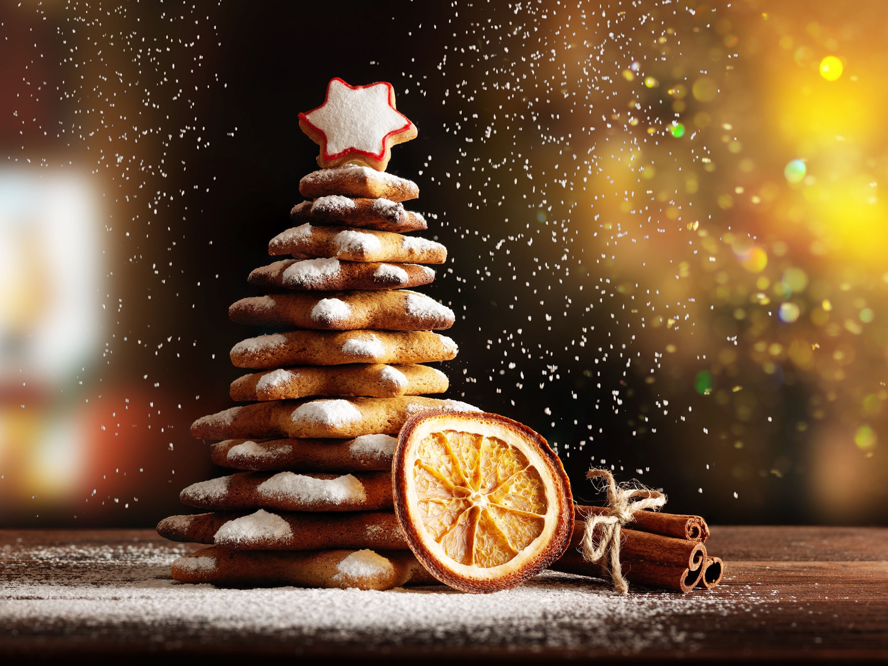 Homemade gingerbread cookies decorated with icing and sugar make up a Christmas tree. (Shutterstock Photo)