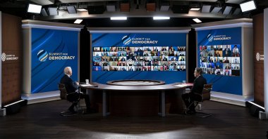 U.S. President Joe Biden (L) speaks as Antony Blinken, U.S. secretary of state, listens during the virtual Summit for Democracy in the Eisenhower Executive Office Building in Washington, D.C., U.S., Dec. 9, 2021. (Photo by Getty Images)