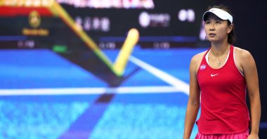 China&#039;s Peng Shuai reacts to a challenge call as she plays against France&#039;s Caroline Garcia, Oct. 5, 2016. (Reuters File Photo)