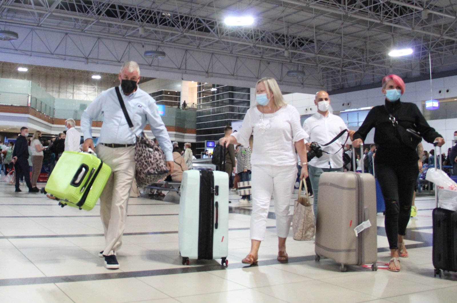 British tourists arrive at an airport in the southern resort city of Antalya, Turkey, Sept. 23, 2021. (IHA Photo)