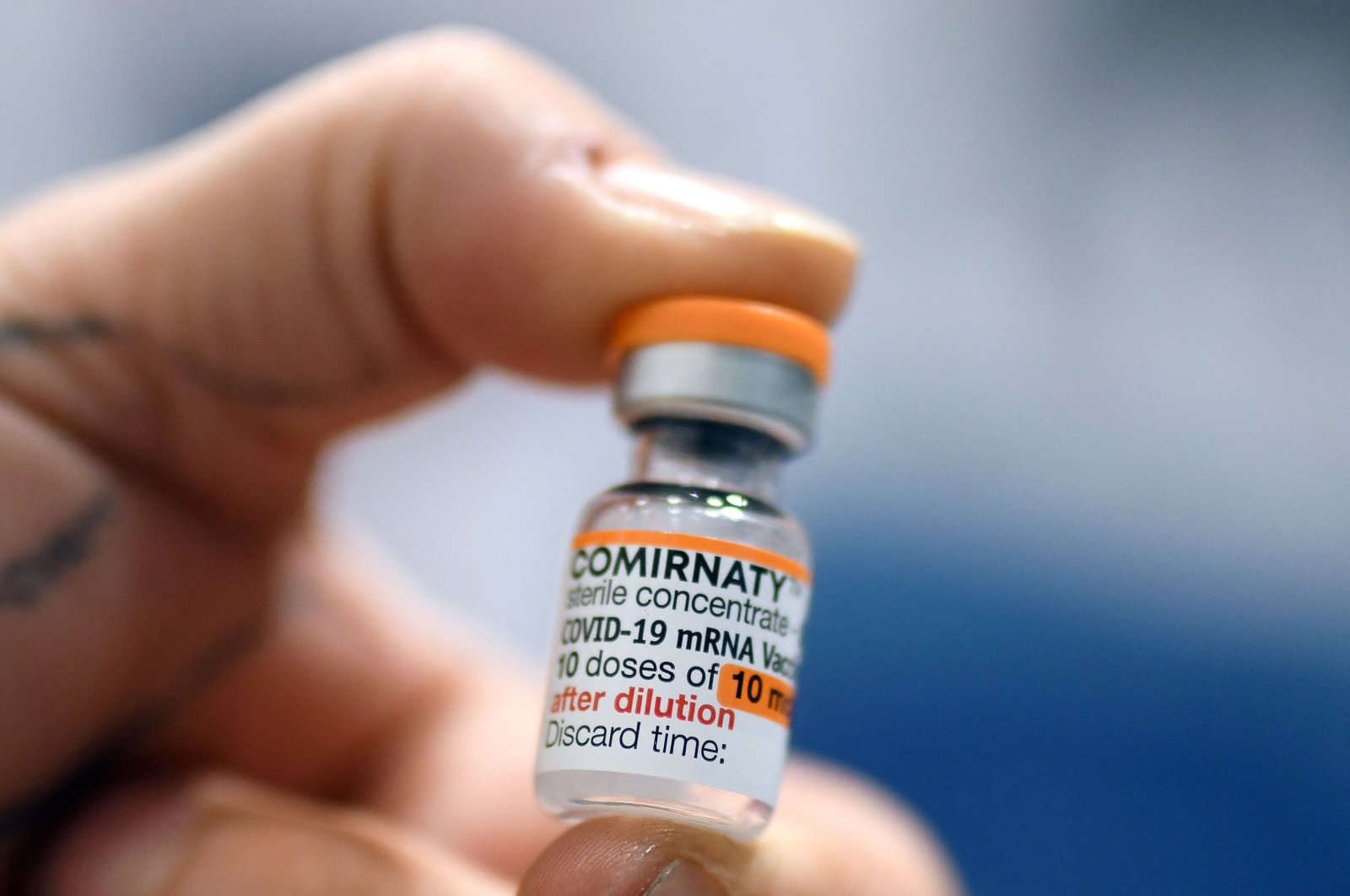A vial of the Biontech-Pfizer vaccine Comirnaty in the pediatric dosage is seen at a children vaccination center in Dortmund, western Germany, Dec. 16, 2021. (AFP Photo)