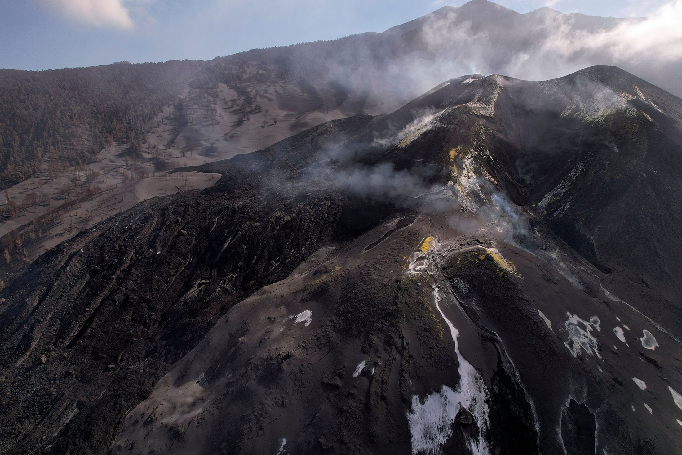 An aerial view of the main cone of the Cumbre Vieja volcano is seen in Tacande, on the Canary Island of La Palma, Spain, Dec. 18, 2021. (Reuters Photo)