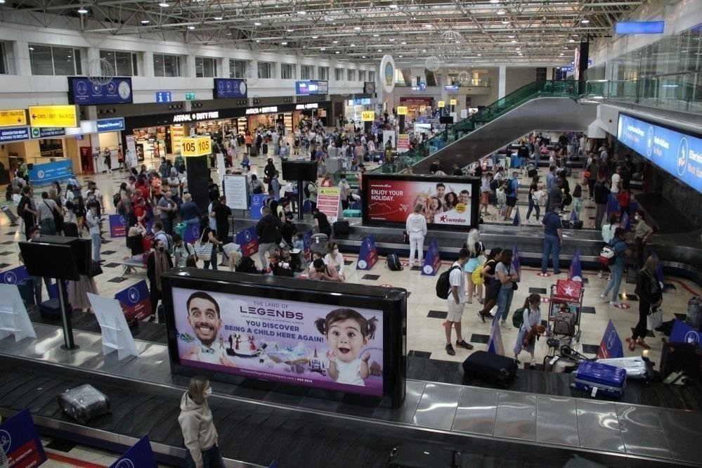 Tourists arrive at Antalya Airport, Turkey, Nov. 30, 2021. (IHA Photo) 