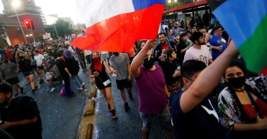 People celebrate the victory of presidential candidate Gabriel Boric in the Plaza de la Dignidad, formerly Plaza Italia, in Santiago, Chile, Dec. 19, 2021. (EPA Photo)