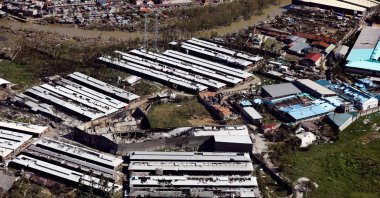A handout photo made available by the Malacanang Presidential Photographers Division (MPPD) shows an aerial shot of destruction in the typhoon devastated island of Bohol, Philippines, Dec. 19 2021. (EPA Photo)