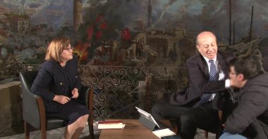 Ankara Representative of Ciner Media Group Muharrem Sarıkaya (L) slaps Ihlas News Agency cameraperson Ahmet Demir during an interview with Gaziantep mayor Fatma Şahin, Turkey, Dec. 19, 2021. (IHA Photo)